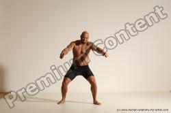 Underwear Gymnastic poses Man Black Muscular Bald Dancing Dynamic poses Academic